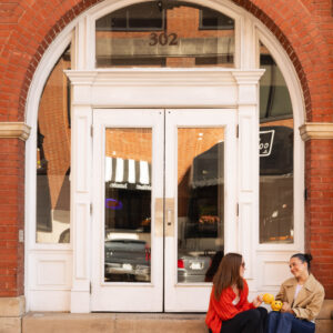 Image of Corner Bakery restaurant entrance door