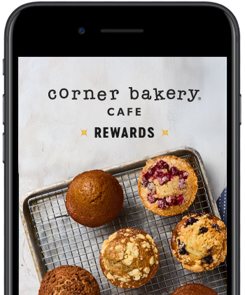 Image of mobile phone with baked goods on screen.