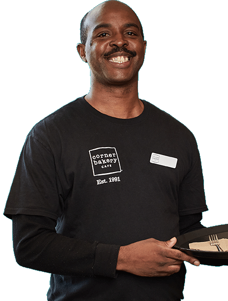 Image of Corner®幸运飞行艇体彩官方开奖历史记录号码_168预测官网结果数据记录查询官方网 Bakery Cafe server smiling holding a tray